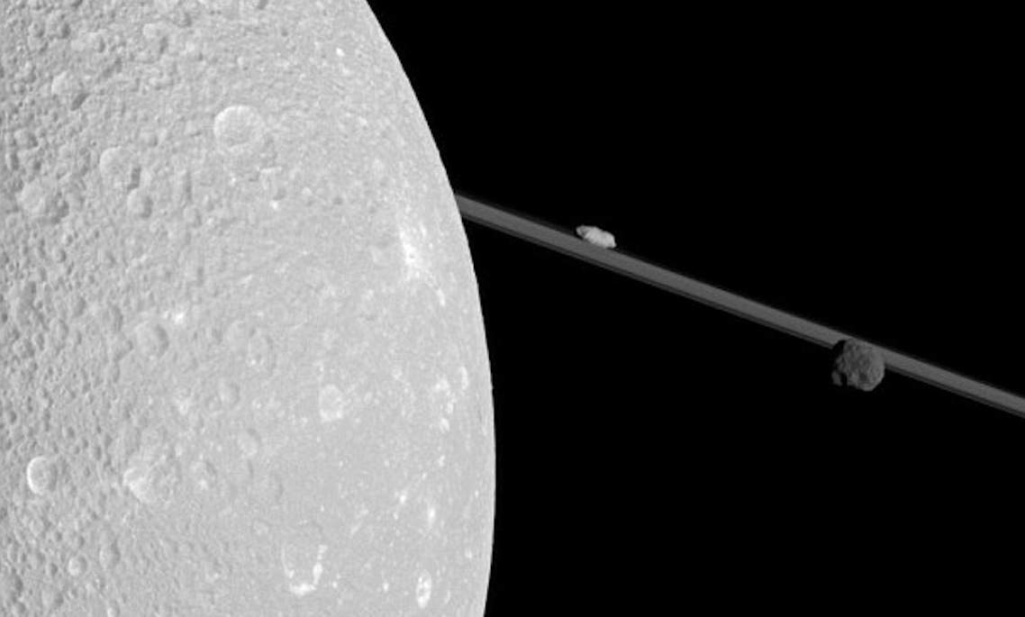 Dione with 2 little moons from Cassini