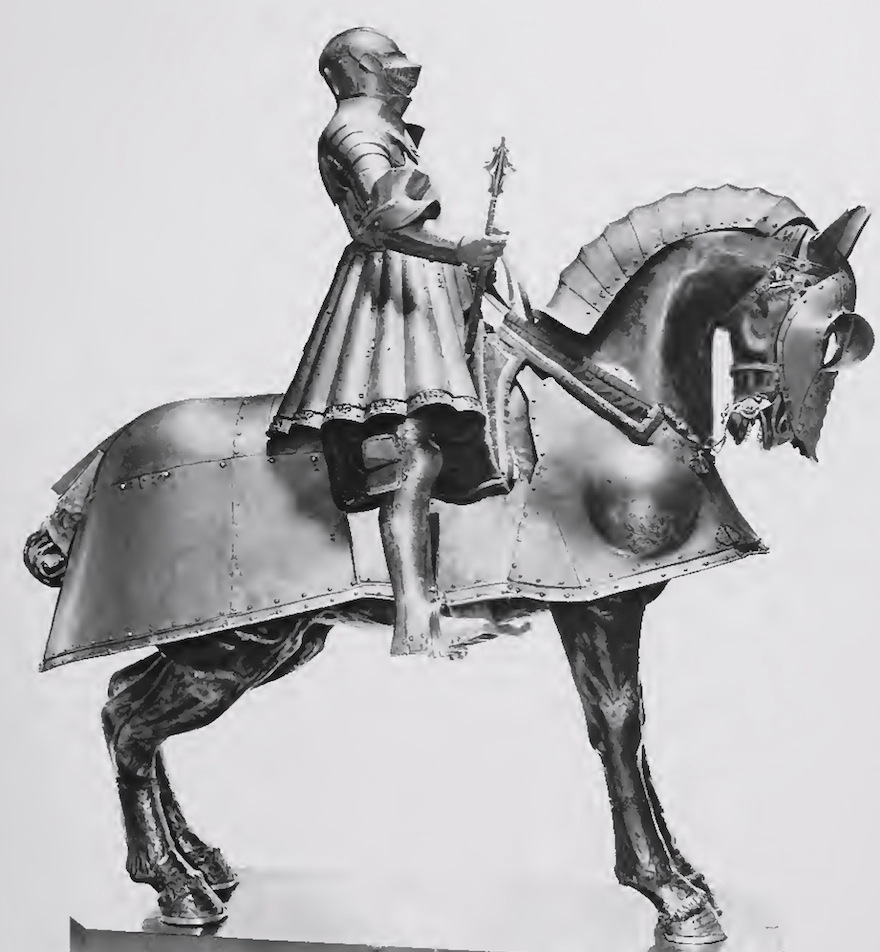 image of Henry's early jousting armour stored in Tower early 20th century