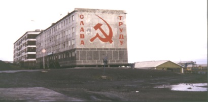 Tiksi flats with slogans on and pillars above the permafrost - photo by Heather Hobden